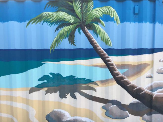 Mural close up at Coach’s Corner palm tree